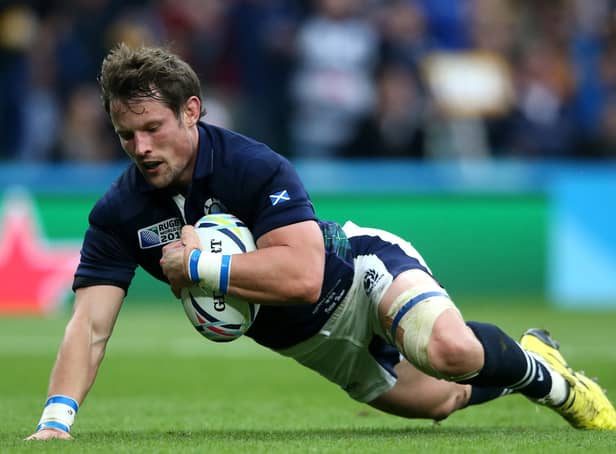 Peter Horne scores Scotland's first try during the 2015 Rugby World Cup quarter final match between Australia and Scotland at Twickenham Stadium. Photo by David Rogers/Getty Images