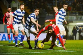Jamie Gullan battles for the ball against Morton. (Pic: Alan Murray)