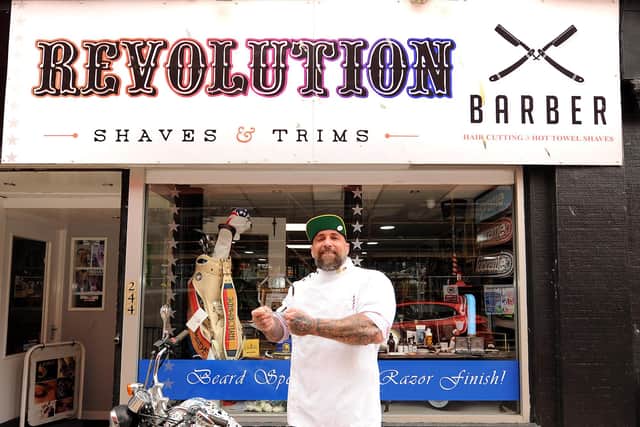 Mark Reynolds, owner of Revolution Barbers, High Street, with his Scottish Beauty Industry awards winner: 5 Star Barbers of the Year: (Pic: Fife Photo Agency)