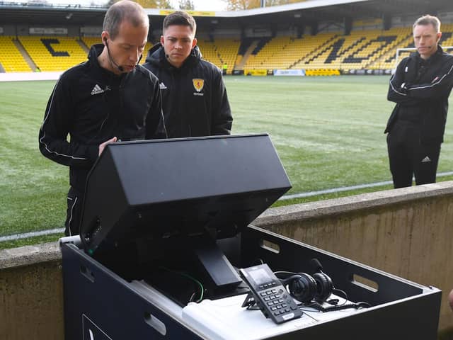 Referee Willie Collum testing a VAR screen before Livingston and Celtic's match on Saturday (Photo by Craig Foy/SNS Group)
