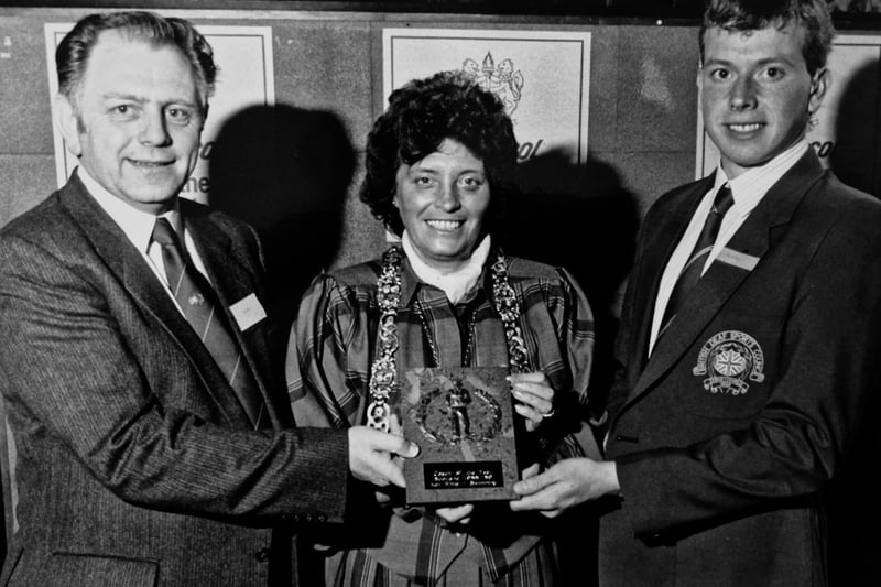 The Bank Dexrosol Coach of the Year award for 1989 went to Ken White (left) and Martin Lee who are pictured receiving their award from Lord Provost Susan Baird