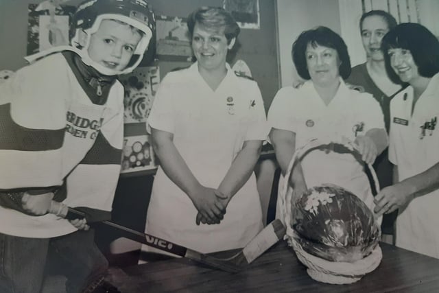 Ice hockey players don’t come any younger than Liam Fisher, aged three and a half at an Easter Egg hand donation to the Victoria Hospital, Kirkcaldy, in 1993. He trained with the Glenrothes Hawks. Also pictured are nursery nurse Kerry Mitchell, Staff Nurse Marlene Walker, Liam’s mum Lisa, and Staff Nurse Laura Clacher.