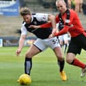 Raith Rovers' Craig Barr going up against Rangers' Kenny Miller during their sides' 3-3 draw at Stark's Park in Kirkcaldy in April 2016 (Pic: SNS Group/Craig Foy)