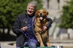 Buster and Kirkcaldy MSP David Torrance have won the Holyrood Dog of the Year title. (Photo by Jeff J Mitchell/Getty Images)