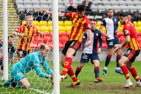 Jamie MacDonald blocks on the goal line from ex-Rover Brian Graham in the match at Firhill between Partick Thistle and Raith Rovers (picture by Sammy Turner / SNS Group).