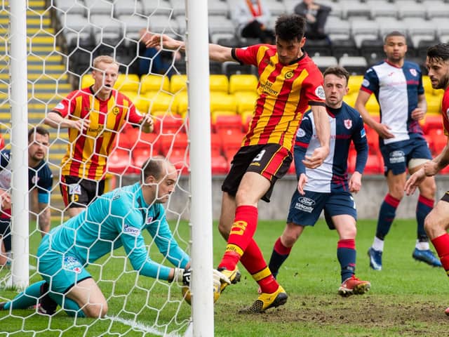 Jamie MacDonald blocks on the goal line from ex-Rover Brian Graham in the match at Firhill between Partick Thistle and Raith Rovers (picture by Sammy Turner / SNS Group).