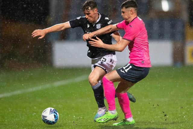 Dundee's Josh Mulligan and Raith Rovers' Connor McBride challenging for the ball on Tuesday (Photo by Mark Scates/SNS Group)