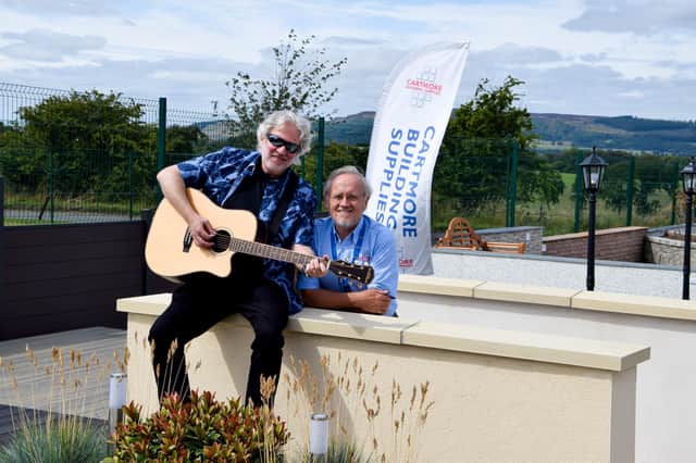 Singer songwriter Dean Friedman with Gordon Banks from Cartmore Building Supplies.