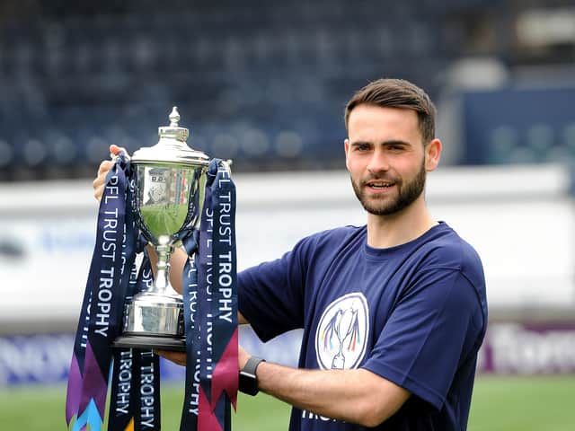 Reghan Tumilty at Stark's Park with the SPFL Trust Trophy. Pic: (Fife Photo Agency)