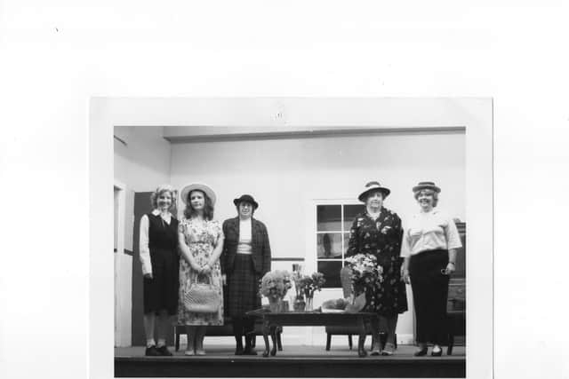 Isabel is pictured second from the right in the dark dress at an Auld Kirk Players performance in the 1990s.
