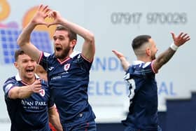 Raith's Sam Stanton acknowleges his love for Mhairi, Nathan, Callen and Ayda after scoring against Dunfermline this season (Pic Fife Photo Agency)