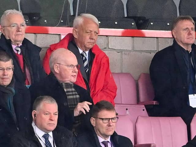 Raith Rovers owner John Sim (in red) watches on during the recent SPFL Trust Trophy final win over Queen of the South at the Penny Cars Stadium, Airdrie.  (Photo by Paul Devlin / SNS Group)