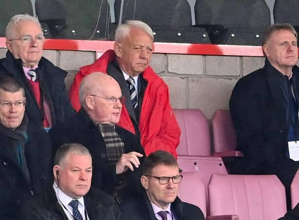 Raith Rovers owner John Sim (in red) watches on during the recent SPFL Trust Trophy final win over Queen of the South at the Penny Cars Stadium, Airdrie.  (Photo by Paul Devlin / SNS Group)