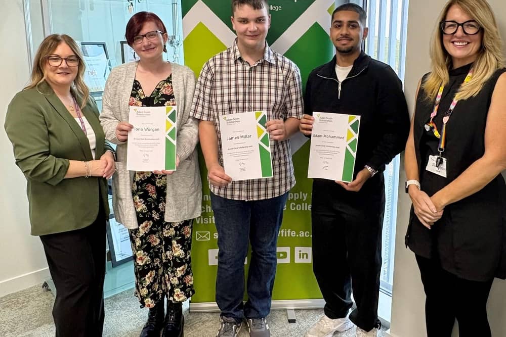 Carole-Anne McCann, Group Recruitment Manager at Arnold Clark, Iona Worgan, James Millar, Adam Mohammed and Sarah-Jane Linton, Fife College Vice Principal are pictured at the Arnold Clark Scholarship 2026 presentation at Fife College’s Dunfermline City Campus. (Pic. Contributed.)