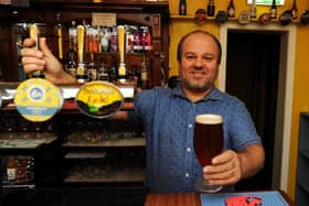 Jon Stanley unveils his first beer to be brewed by the Harbour Bar (Pic: Fife Photo Agency)