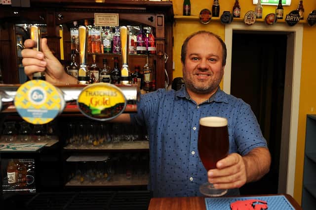 Jon Stanley unveils his first beer to be brewed by the Harbour Bar (Pic: Fife Photo Agency)