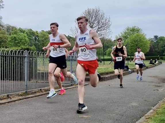 Ravenscraig Mile winner Ben Kinninmonth is pictured during race with Jamie Greig, who finished fourth