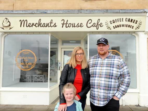 Ricky Barclay - owner of the new Merchants House cafe - with his wife Marzena and daughter Hanna. Pic: Fife Photo Agency.