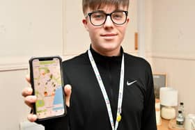 Arron Reekie showing the NHS CPR app he used to receive the call (Pic: Fife Photo Agency)