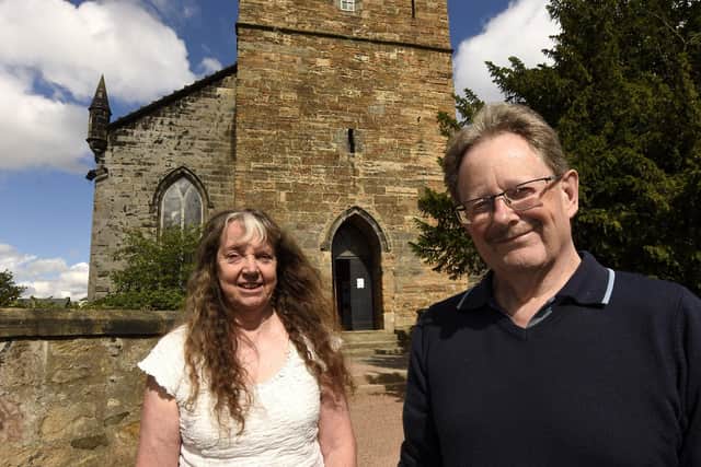 Rosemary Potter (Old Kirk Trust chairperson) and George Proudfoot (trustee) with the tower in the background. Pic: Fife Photo Agency.