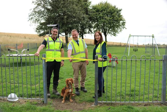 The playpark was opened with a ribbon cutting attended by representatives from Fife Housing Group and JRG Group - and Cody the dog!