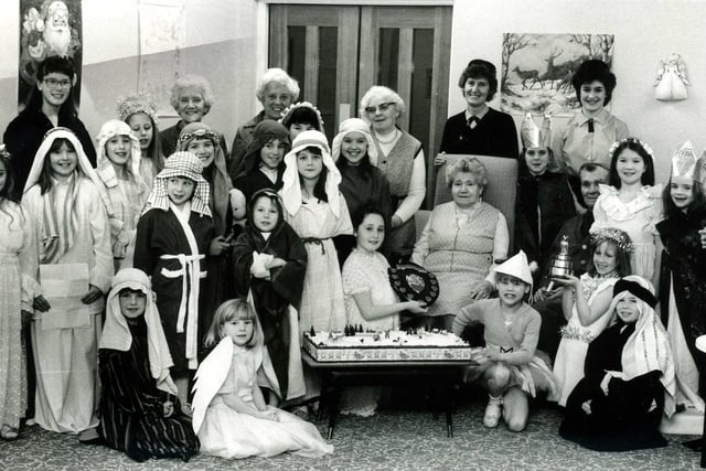 The 8th Glenrothes Brownies swapped their uniforms for nativity costumes when they entertained residents at Jubilee Grove Sheltered Housing in Stenton in December 1985