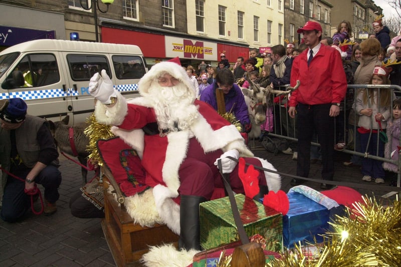 The event marked Santa's arrival in town to take up residence in his grotto in the Mercat.
