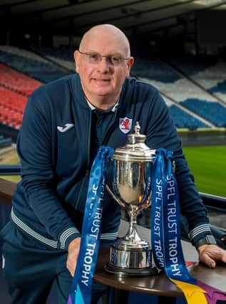 John McGlynn with the SPFL Trust Trophy. (Pic: Craig Watson)