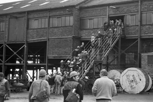 Miners entering the Frances colliery during the miners' strike in February 1985.