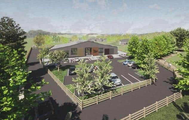 The park could see an old barn transformed into a reception area with cafe and retail units