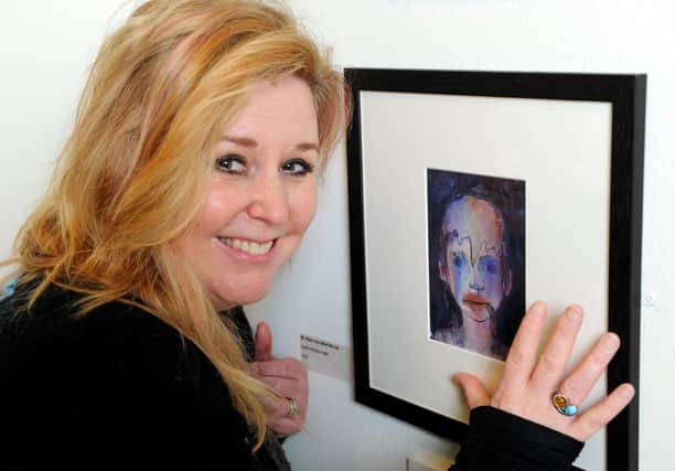Sophie McKay Knight with her work "When you call me Liar".  Picture: Colin Hattersley.