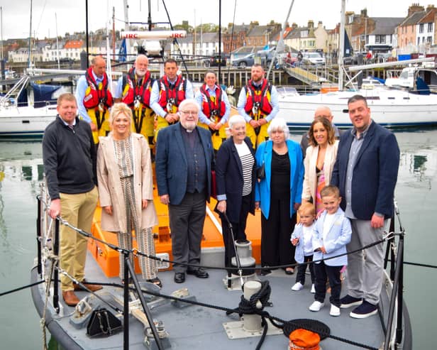 Zander and Fletcher Macnamara were the last youngsters to be christened on board Anstruther's Mersey class lifeboat The Kingdom of Fife.  Their mum, Lindzi Tarvit, was the first to be christened on the same boat alongside her twin brother Liam.  (Pic: Submitted)