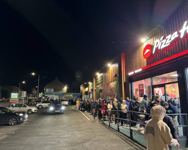 People queued last Wednesday outside Pizza Hut on Kirkcaldy's St Clair Street to get a £1 pizza while supporting the Cottage Family Centre.  (Pic: Pizza Hut Kirkcaldy)