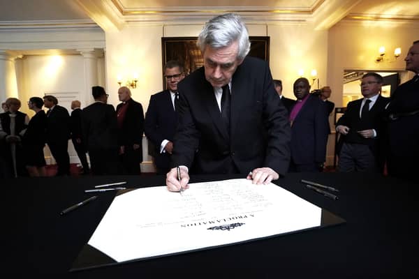 Gordon Brown signs the Proclamation of Accession of King Charles III following the Accession Council ceremony at St James's Palace. (Photo by Kirsty O'Connor - WPA Pool/Getty Images)