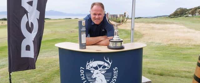 Alastair Forsyth shows off the trophy after winning the Loch Lomond Whiskies Scottish PGA Championship 2022 at West Kilbride.