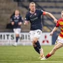Raith Rovers' Scott Brown going up against Partick Thistle goal-scorer Scott Tiffoney the last time the two sides met, at Stark's Park in Kircaldy, on May 5 (Pic: Roddy Scott/SNS Group)