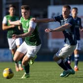 Hibernian's Kevin Nisbet and Raith Rovers' Liam Dick in action during Iain Davidson's testimonial match at Starks Park in Kirkcaldy in July 2021 (Photo by Ross MacDonald/SNS Group)