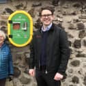 Marilyn Edwards of the Craigencalt Rural Community Trust and Tom Antram, Communications Consultant at Fife Ethylene Plant with the defibrillator at Kinghorn Loch.