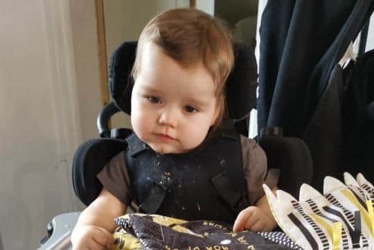 Asher's parents are hoping to raise money to continue his treatment