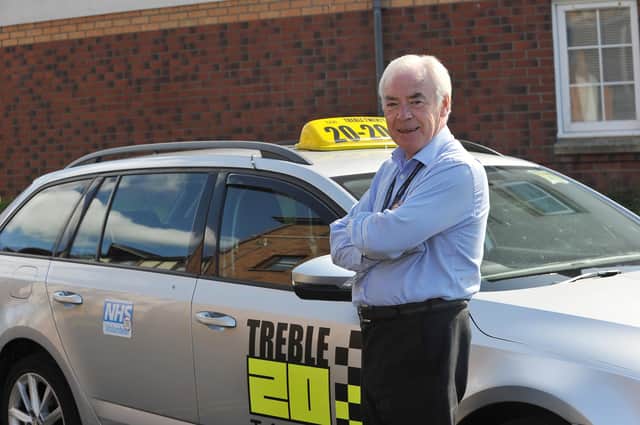 Bill Convery with his taxi