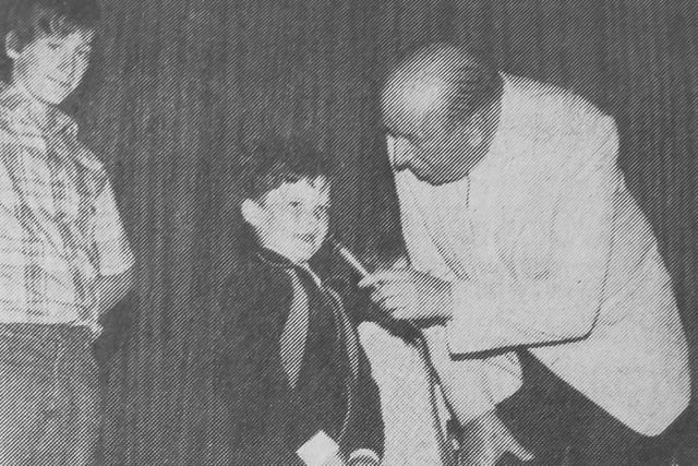 1982 - Holiday On  Parade show at Philp Hall, Kirkcaldy, hosted by Mr Showbiz' Archie McCulloch - he is on stage with little James Nelson who explains why his mum is the best