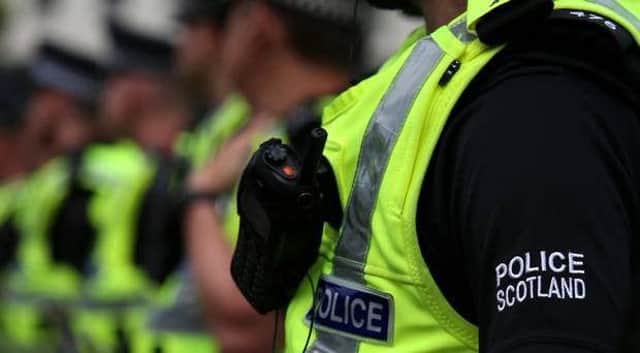 Police probe reports of sexual and homophobic comments towards woman on Fife train.