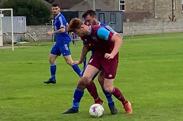 Mackenzie Williamson retains possession for Cupar Hearts. Pic and report Hayley McHugh