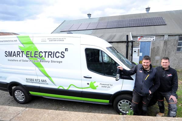 Burntisland - Fife - 
 Smart Electrics - Willie & Brian Smart with EV, powered by the Solar panels on the roof of their workshop 
credit- Fife Photo Agency