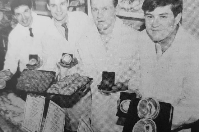 David Smith’s mouthwatering recipes saw more awards for John Henderson, butchers, who had a shop in Kirkcaldy’s High Street.
He received medals and certificates from international food writer, Egon Ronay.
David (left) is pictured with Iain Fleming, William Brydon and Paul Wilson.
