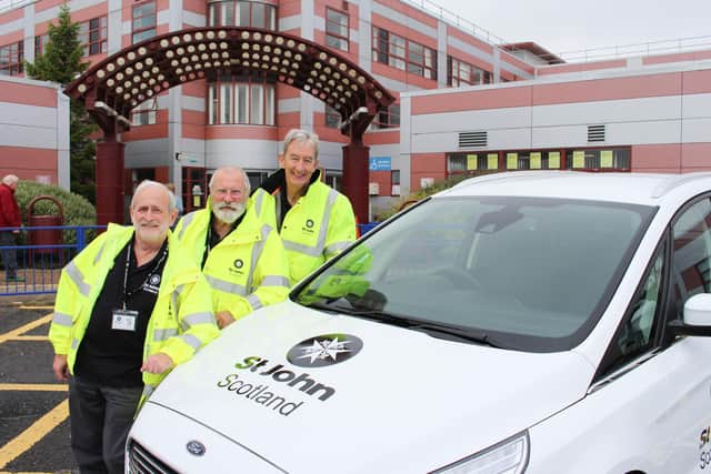 St John Scotland patient transport service volunteers, from left to right, Lawson Rennie, Findlay Macrae, and Ewen Macdonald.