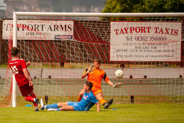 Jamie Gill wraps up a convincing win for Tayport by hitting goal number four. Picture by Matt Hooper / This is St Andrews.