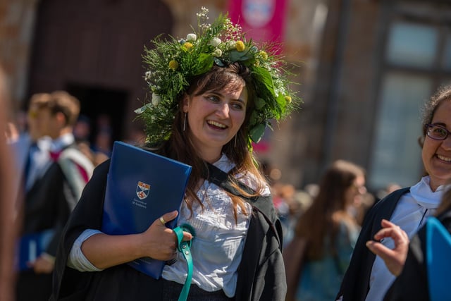 New St Andrews graduates celebrate in the University's historic St Salvator's Quad.