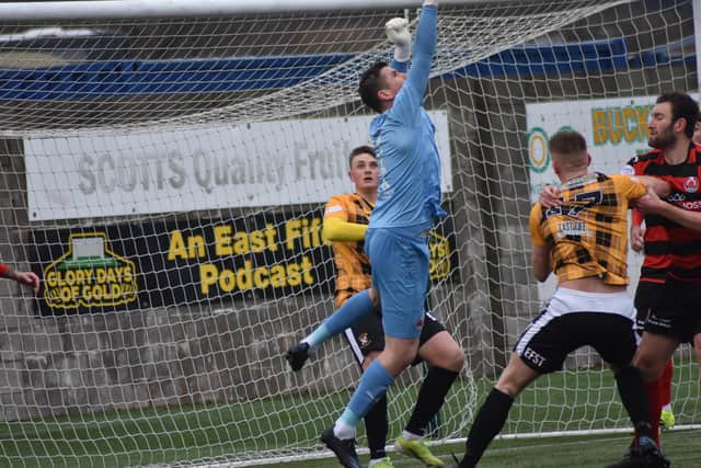 Clyde goalkeeper Neil Parry snuffs out an East Fife attack