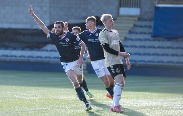 Sam Stanton celebrates making it 3-0 against Cove (Pic by Sammy Turner/SNS Group)